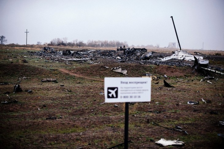 MH17: Poutine accuse les forces ukrainiennes de bombarder le site du crash - ảnh 1